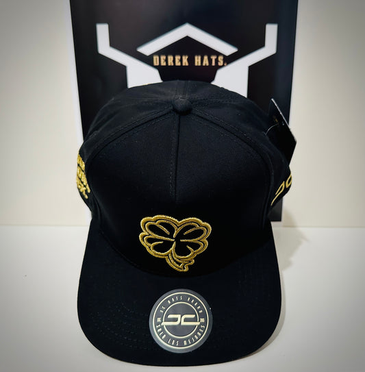 Gorra Trébol Oro Negro